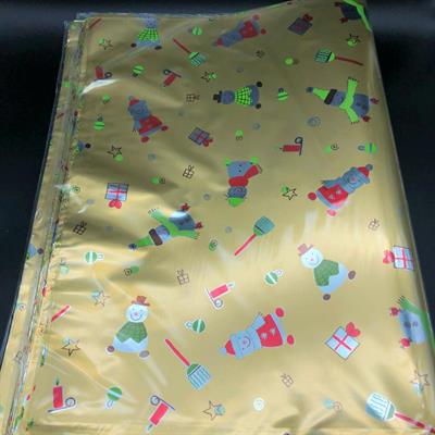 BUSTA NATALE 35x50 ORO PUPAZZI